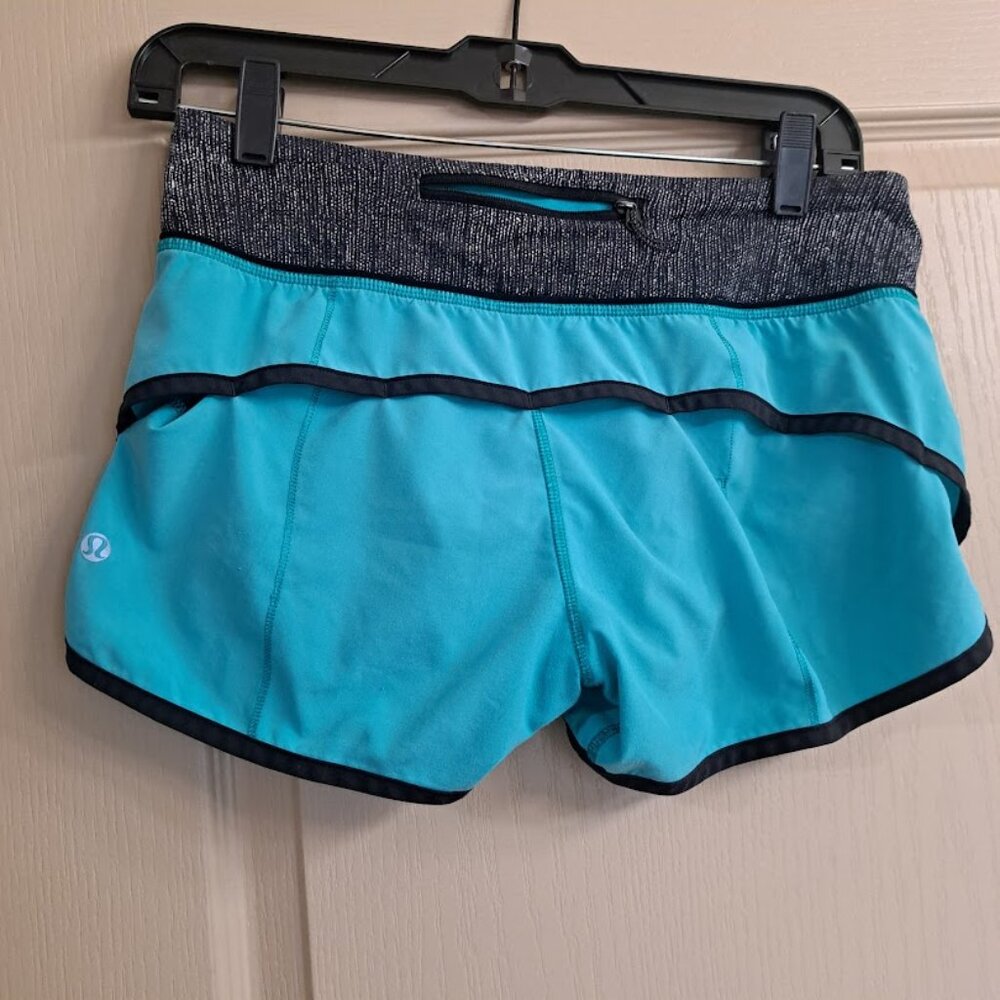 Lululemon WOmen's shorts size 4 teal and black with liner Running shorts